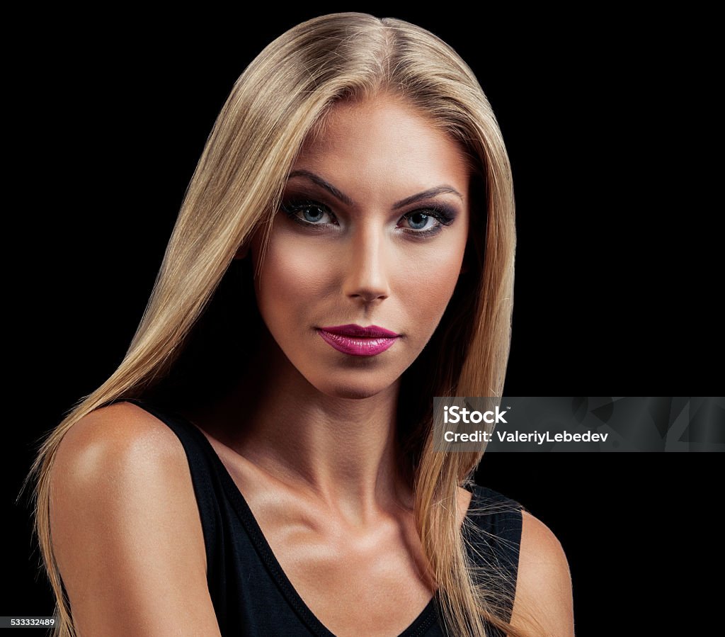 Professional Make up concept Professional Make up concept. Portrait of young beautiful woman with beauty makeup and perfect skin. Isolated on black background 2015 Stock Photo