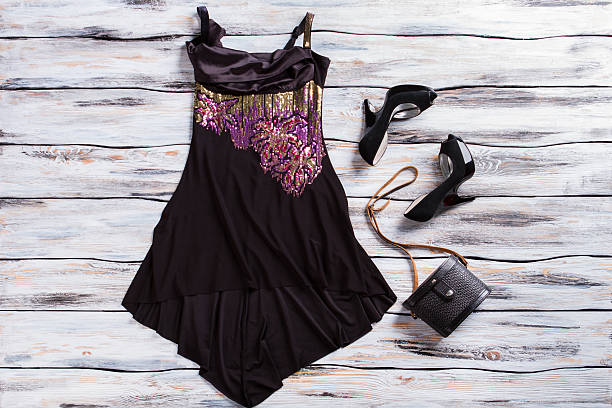 istock Black sleeveless dress and shoes. 533332628