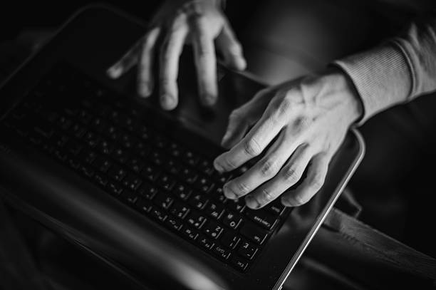 istock Close-up typing male hands on laptop keyboard 533332664