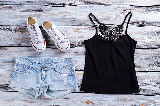 istock Denim shorts and black top. 533333718