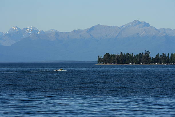 istock boat speeding across lake Te Anau 533333827