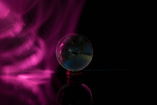 istock purple wave on left of glass orb 533333837