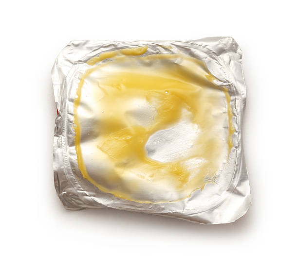 istock Used part of yogurt package 533335240