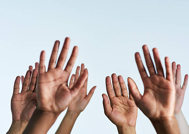 istock Raise your hands in support of each other 533336962