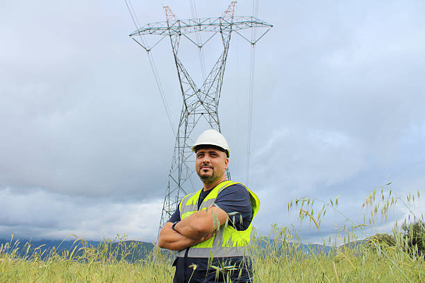 elettricista - maintenance engineer fuel and power generation power line electricity foto e immagini stock