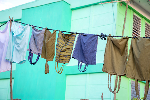 Laundry hanging on a rope, Cuba