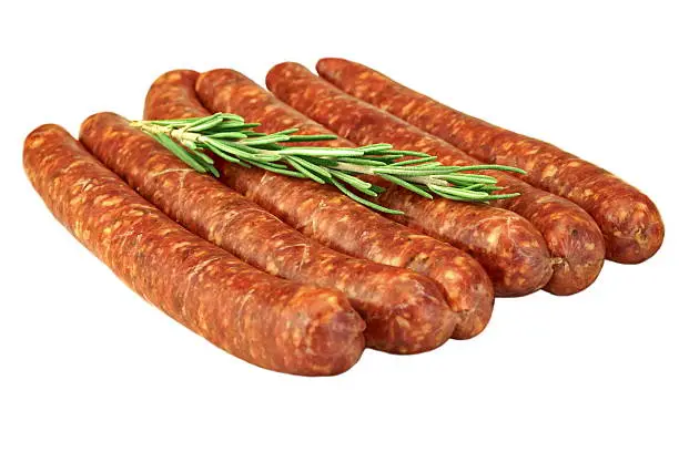 Sausages Made Of Chorizo Mince In Natural Casing From Intestines In  A Heap Isolated On White Background, Cookout Food For Grilling Or Barbecuing, Top View, Close Up