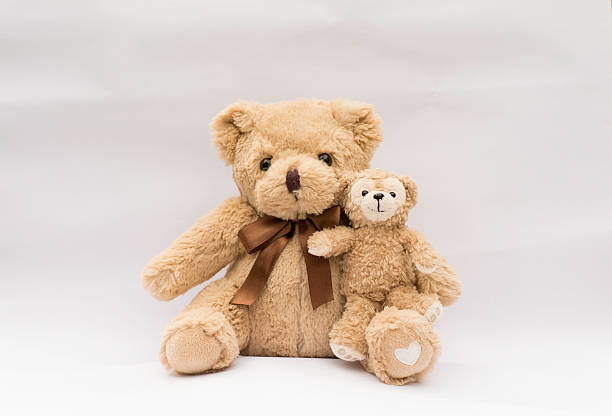 istock Family teddy bears on a white background . 533341664