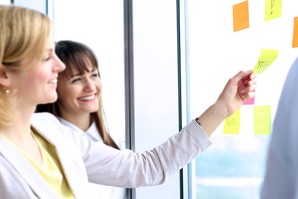 istock business team working  with   digital tablet and stickers in office 533342440