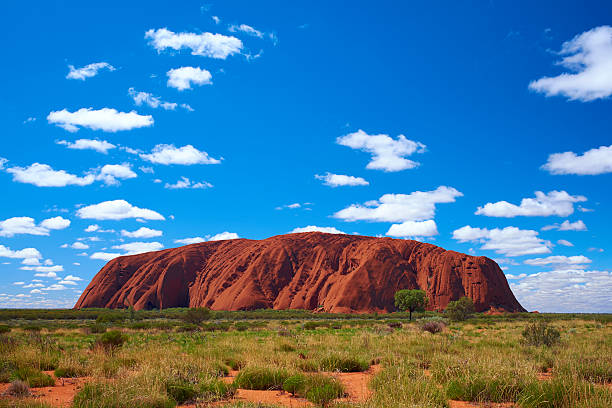 Clouds Over Uluru stock photo