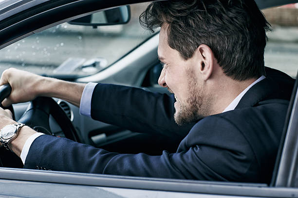 istock Businessman driving angry in car 533342778