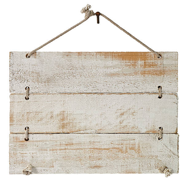 istock Three white weathered wood panels hanging from an old nail. 533344382