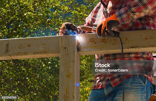 The Welder On A Construction Stock Photo - Download Image Now - Grid Pattern, Welder, 2015