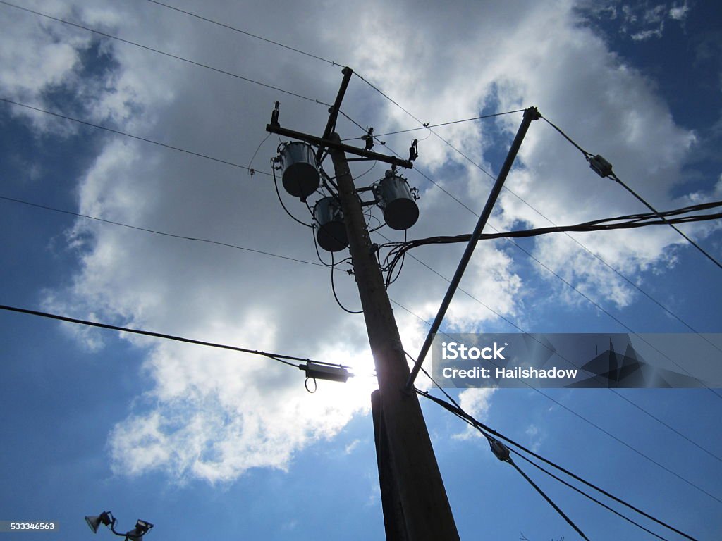 Electricity pole with transformers View of Electricity pole with transformers and distribution cables 2015 Stock Photo