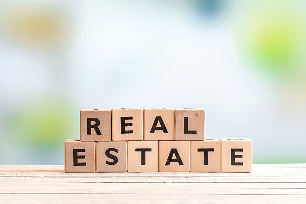 istock Real estate sign on a wooden table 533347006