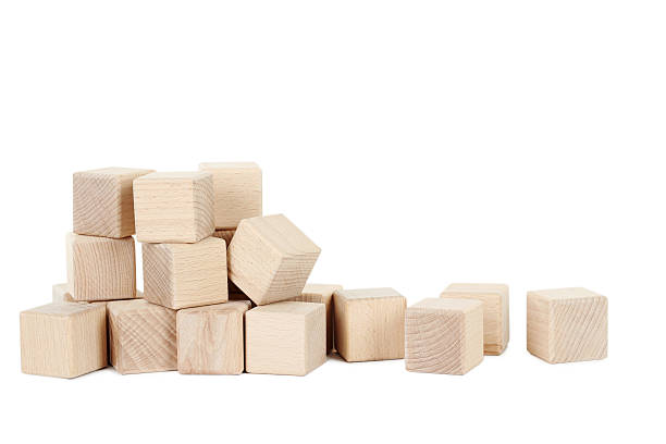 istock Wooden toy cubes isolated on a white 533347182