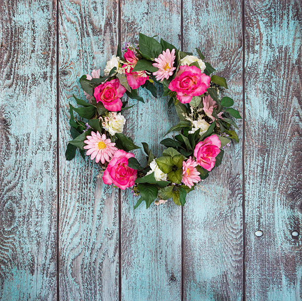 istock Floral wreath on vintage green background 533347521