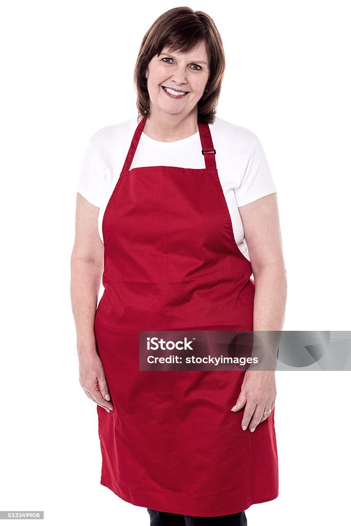 Studio shot of female chef Senior chef posing to camera over white Active Seniors Stock Photo