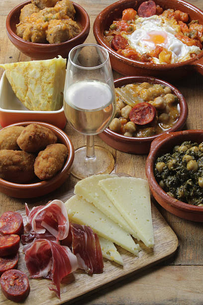 traditional spanish tapas a variety of spanish traditional tapas with sherry wine tortilla de patatas stock pictures, royalty-free photos & images