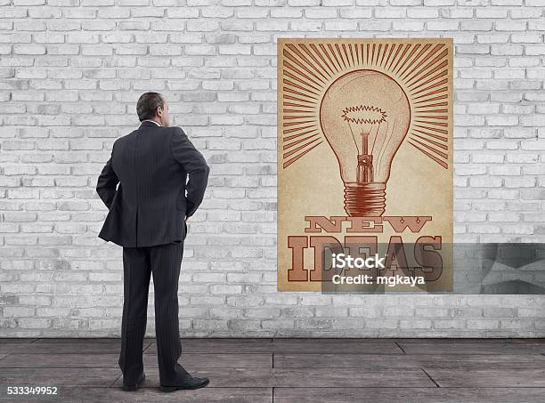 Businessman And New Ideas Poster Stock Photo - Download Image Now - Adult, Aspirations, Brick