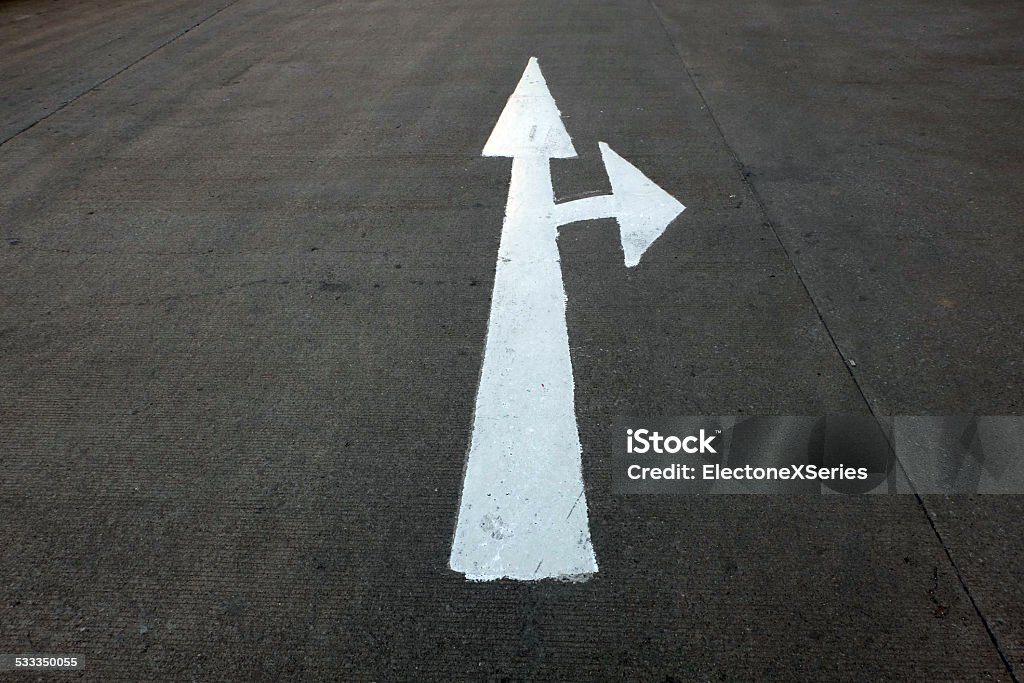 Sign Arrow traffic sign on the road 2015 Stock Photo