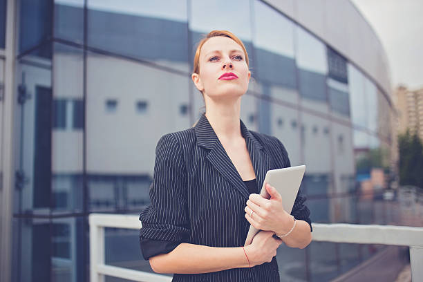 istock Girl holding Tablet 533350222