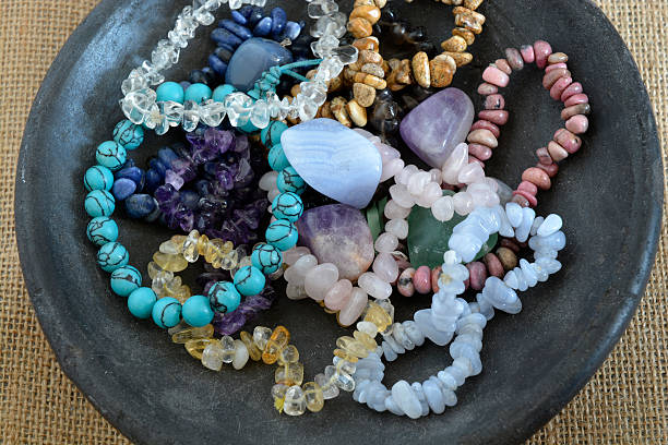 istock Healing properties of gemstones and crystals on empty jute background 533354806