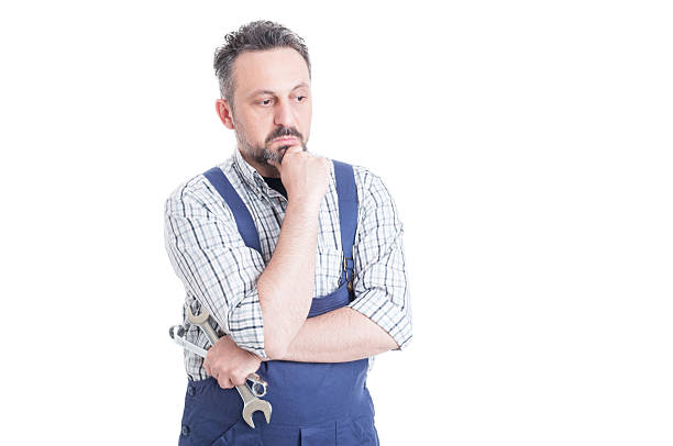 istock Thoughtful man portrait with young mechanic looking worried 533355550