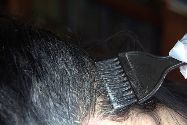 istock hair coloring in a beauty salon 533356362