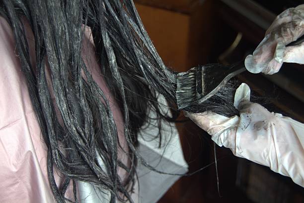 istock hair coloring in a beauty salon 533357246