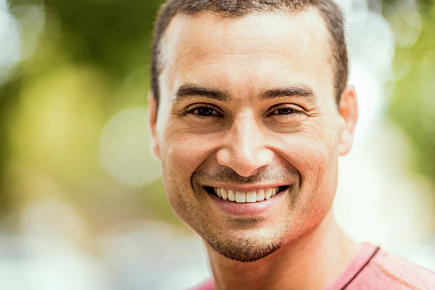 istock Confident jogger smiling in park 533357556