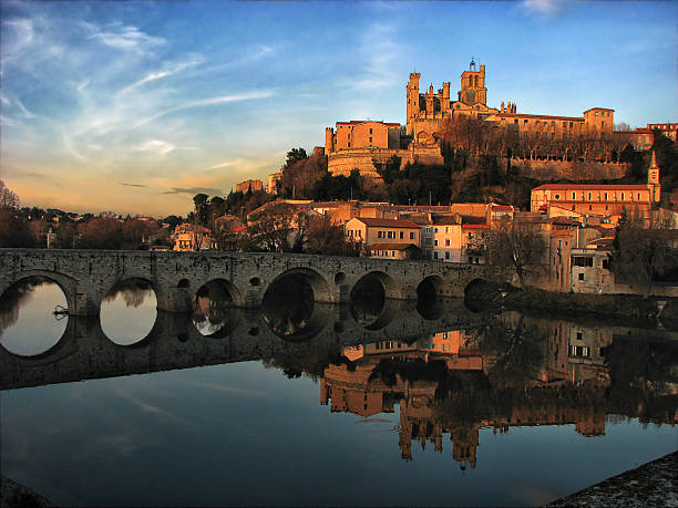 St. Nazaire Cathedral and Pont Vieux St. Nazaire Cathedral and Pont Vieux. Reflections in Orb river beziers stock pictures, royalty-free photos & images