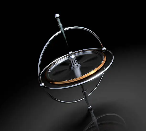 A spinning gyroscope on  black background