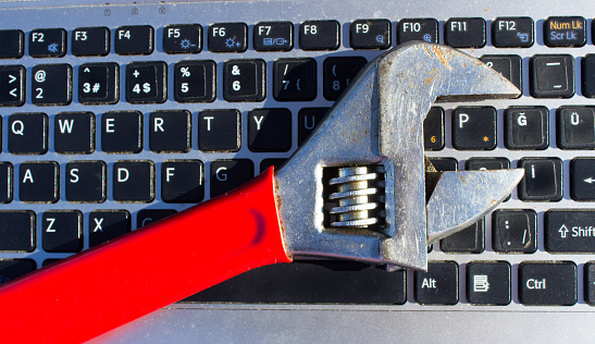 A wrench on the laptop