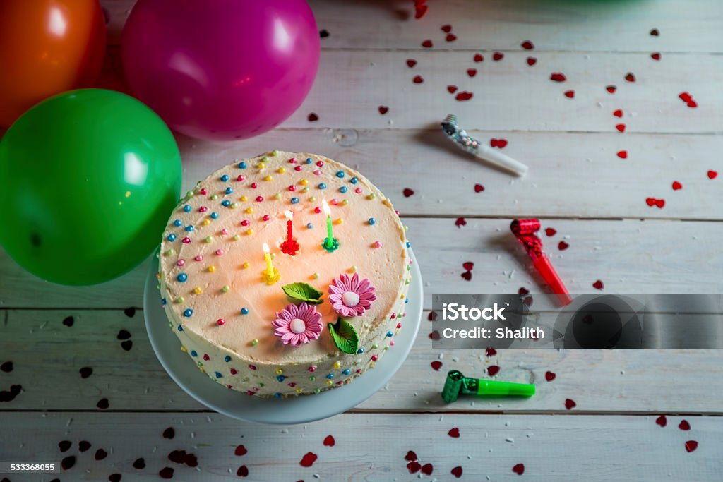 Time to blow out the candles from birthday cake Time to blow out the candles from birthday cake. 2015 Stock Photo