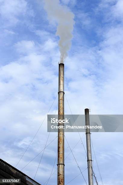 Pollution From Factory Chimney In Thailand Stock Photo - Download Image Now - 2015, Blue, Business