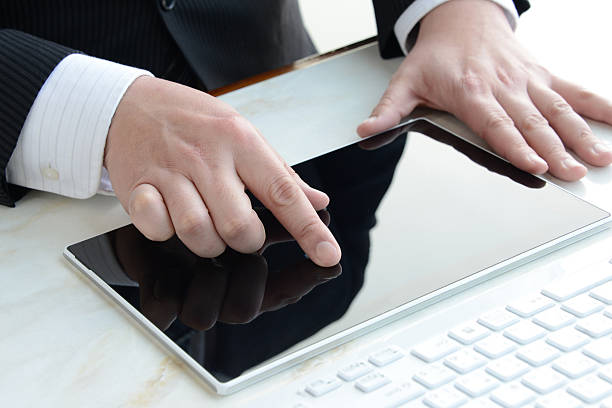 istock Businessman usisng degital tablet 533377597