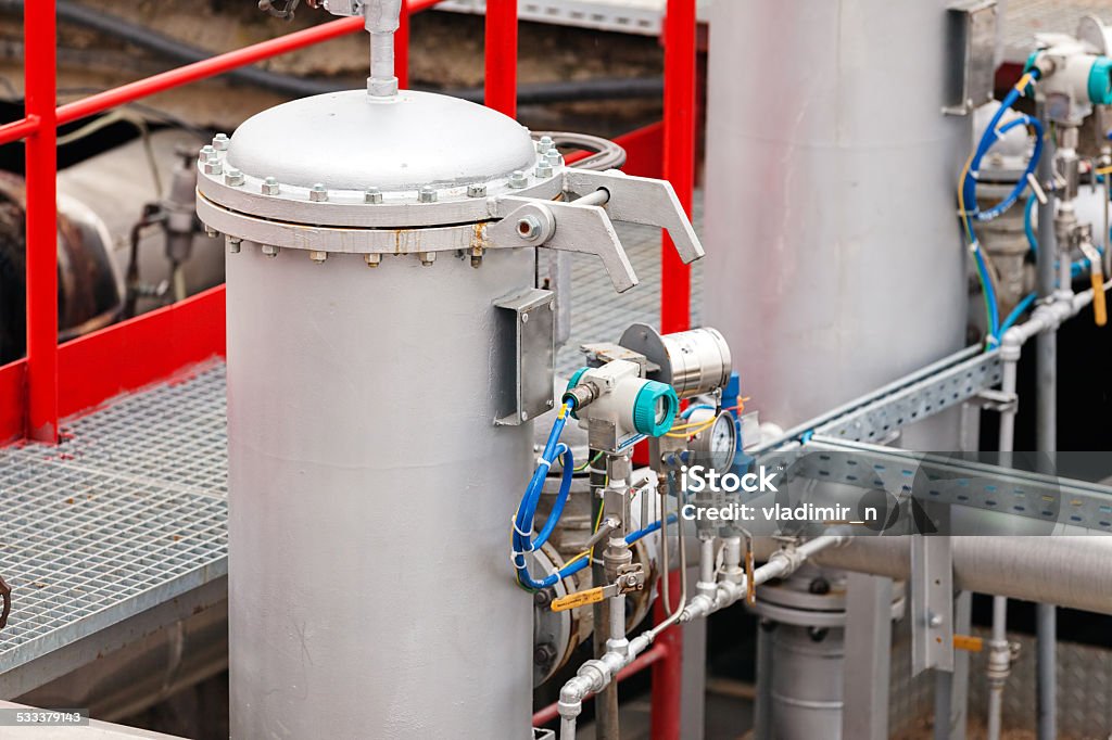 oil refinery detail of oil pipeline with valves in large oil refinery 2015 Stock Photo