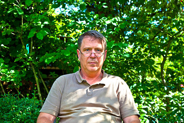 istock man sitting in his garden 533379453