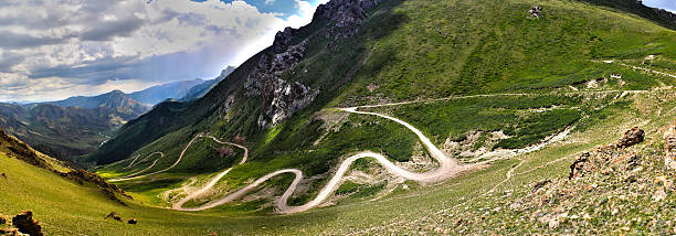Serpentine road in the mountains Panorama of the serpentine road in the mountains, son-kul, naryn region, kyrgyzstan number 33 stock pictures, royalty-free photos & images