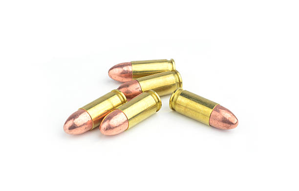istock 9mm bullet for a gun isolated on white background. 533381005