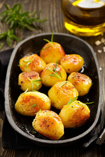 istock Baked potatoes with rosemary. 533396395