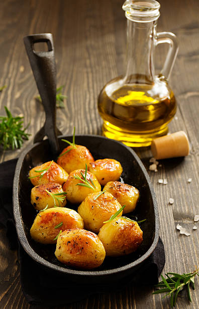 istock Baked potatoes with rosemary. 533396531