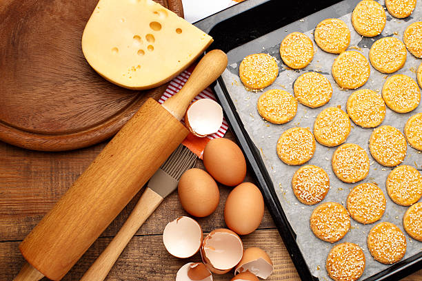 istock Cheese Biscuits on wooden background 533396551