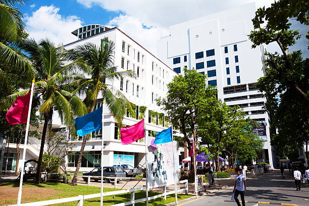 Singapore, 08 Nov, 2020: Typical Singapore public housing apartments where laundry is hung out to dry on bamboo poles from balconies.