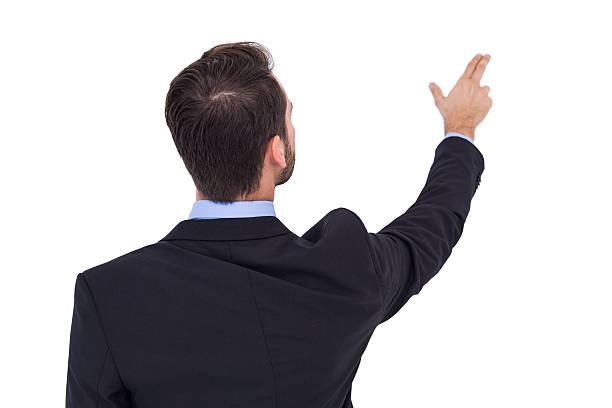 istock Businessman in suit pointing fingers 533397111