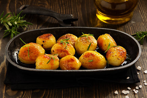 istock Baked potatoes with rosemary. 533397323