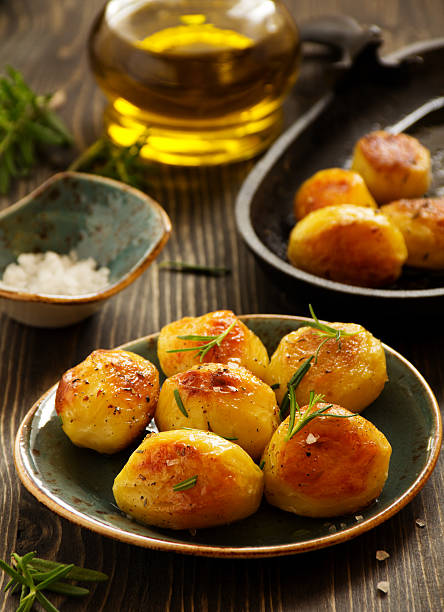 istock Baked potatoes with rosemary. 533397331