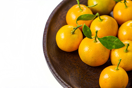 Orange (Citrus Japonica Thunb) on white background