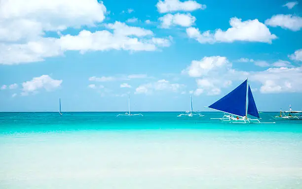 Sailing on the Boracay - Philippines. Blue sky on the background. Shot taken with a Canon 5D MK III.
